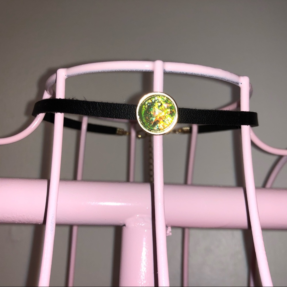 Choker with green and gold stone